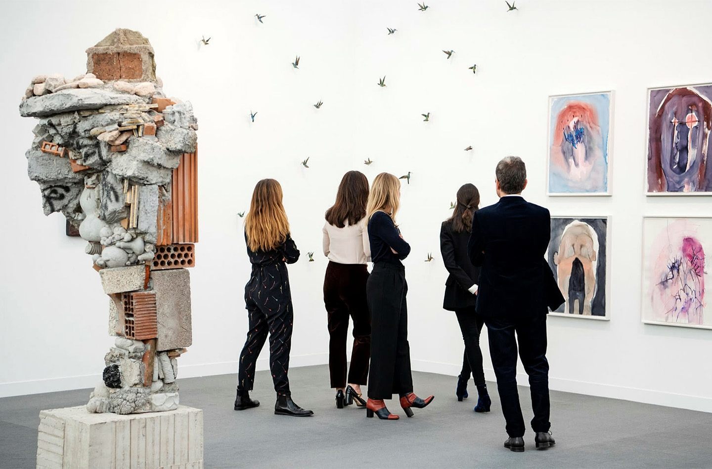 People at an art fair looking at art work