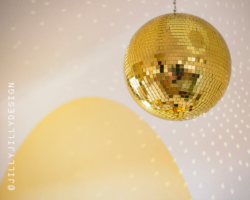 Lick Yellow 01 and a gold disco ball