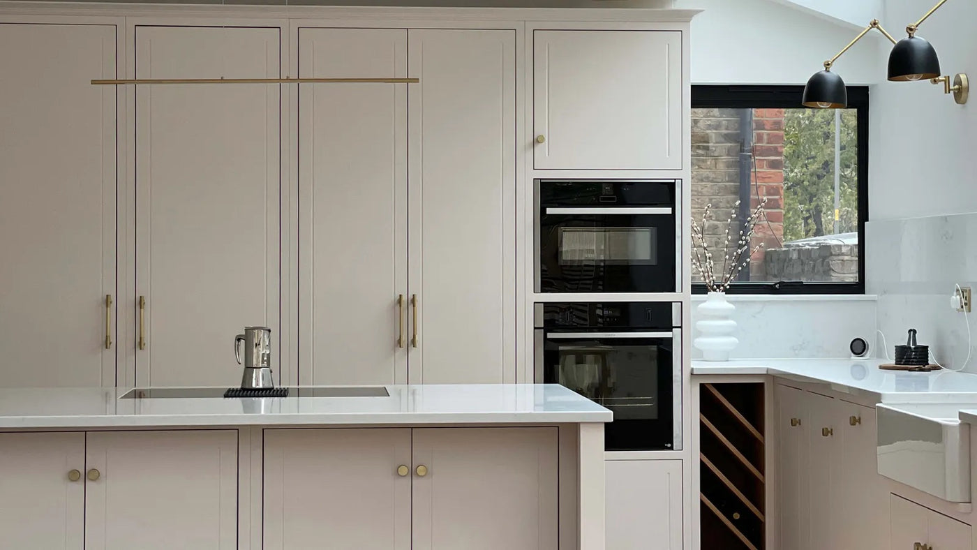 Neutral kitchen cabinets and cupboards decorated in Lick Pink 01 paint shade 