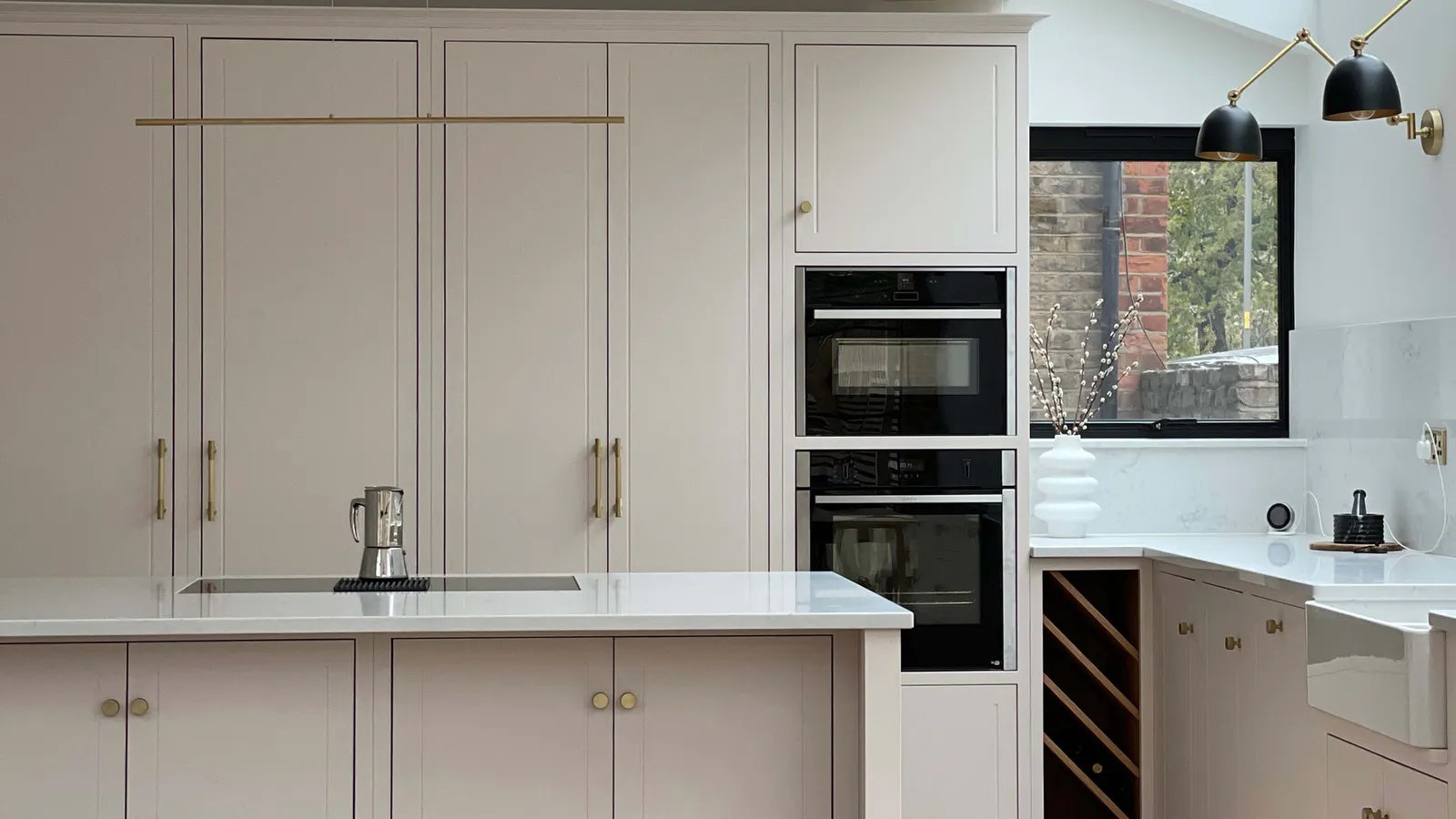 Neutral kitchen cabinets and cupboards decorated in Lick Pink 01 paint shade 