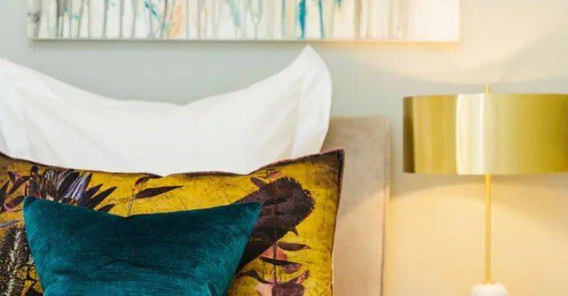 Restful master bedroom inspiration decorated in teals and yellows