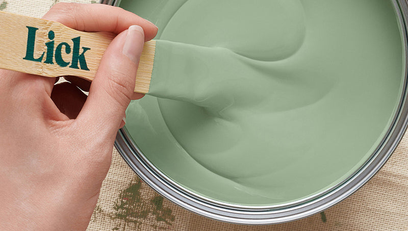 Lick Green paint being stirred