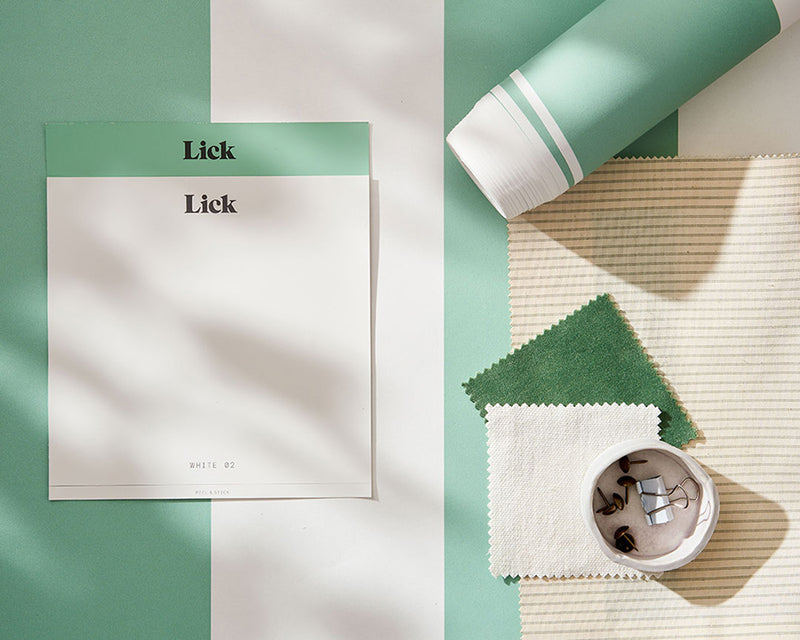 Green and white peel and stick samples and wallpaper