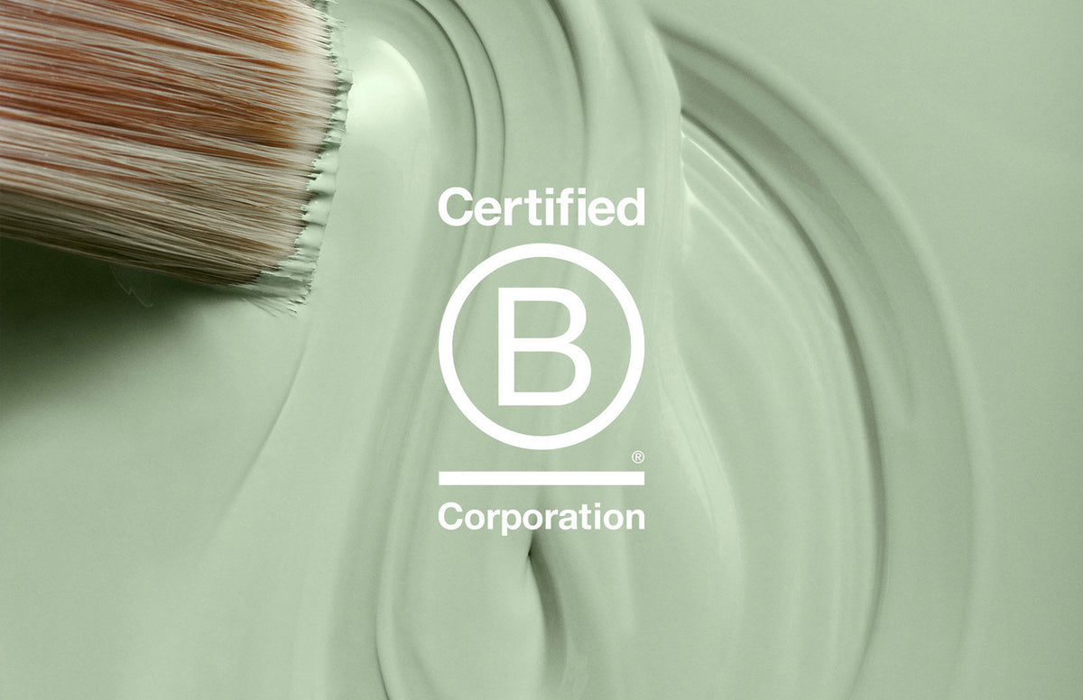 Lick green paint with a B-Corp logo